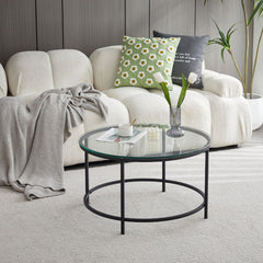 Masuta de cafea rotunda cu cadru metalic negru si blat din sticla securizata 6 mm grosime, 70x40 cm Bayamo HARO