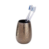Hectarul - Suport ceramic maro pentru periuta de dinti Marrakesh Wenko